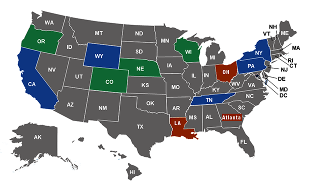 A map of the United States. CA, NY, PA, TN, and WY are shaded blue. CO, NE, OR, and WI are shaded green. OH, LA, and Atlanta are shaded red. All other states are shaded gray.